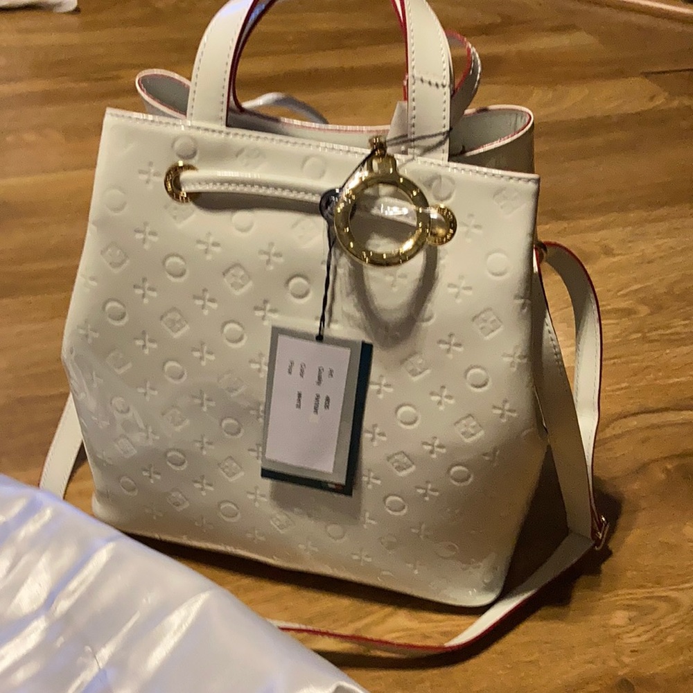 White trimmed red leather patent
